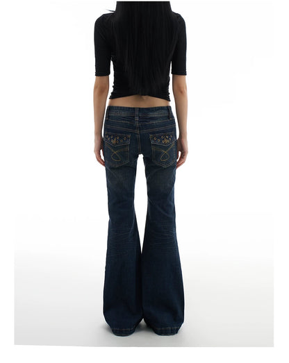 RIVET LOW-WAIST JEANS