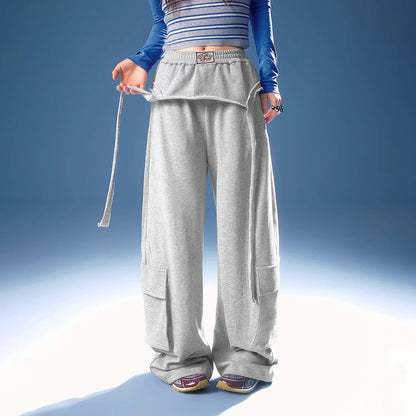 ASYMMETRICAL FRAYED EDGE PANTS