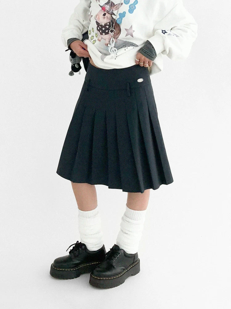 PLEATED MID-LENGTH PEPLUM SKIRT