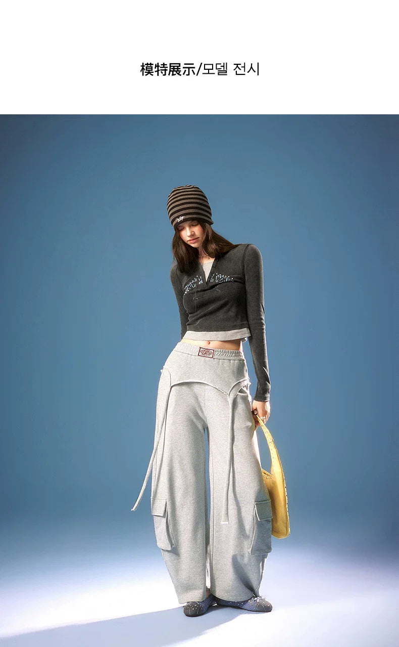 ASYMMETRICAL FRAYED EDGE PANTS