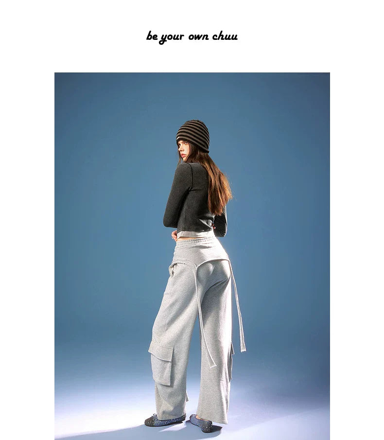 ASYMMETRICAL FRAYED EDGE PANTS