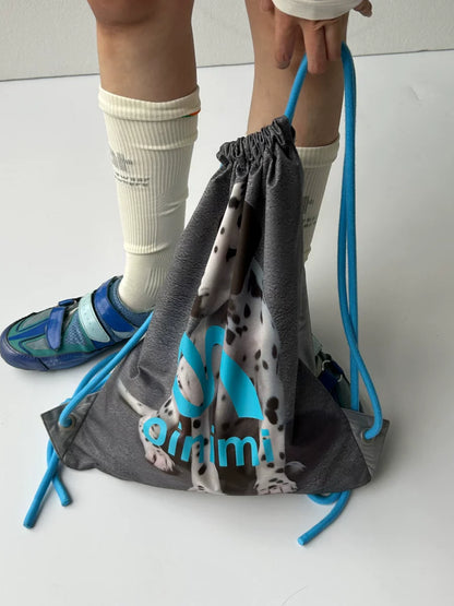 REVERSIBLE DRAWSTRING BACKPACK BAG