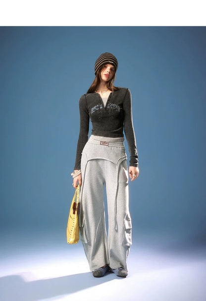 ASYMMETRICAL FRAYED EDGE PANTS