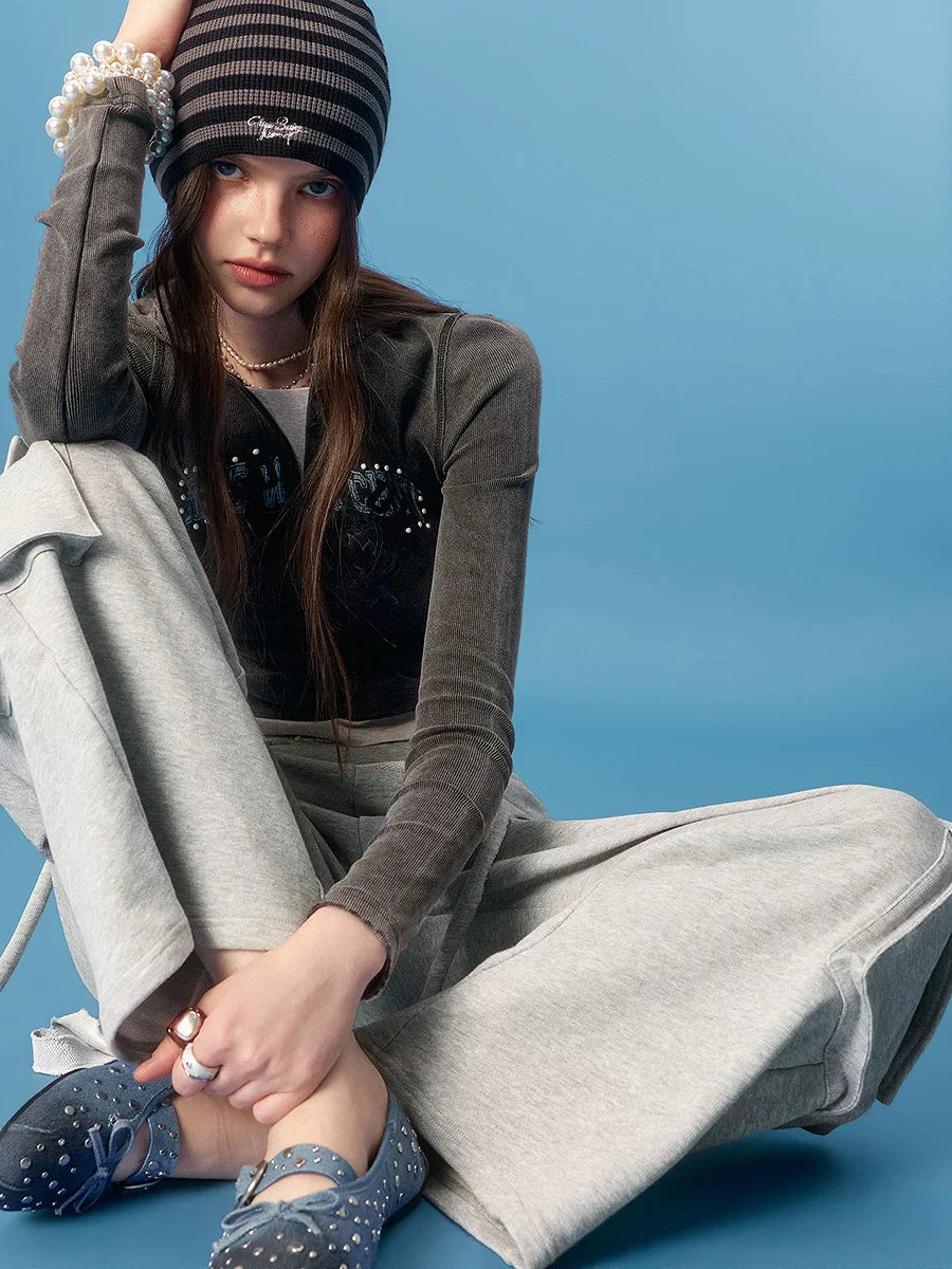 ASYMMETRICAL FRAYED EDGE PANTS