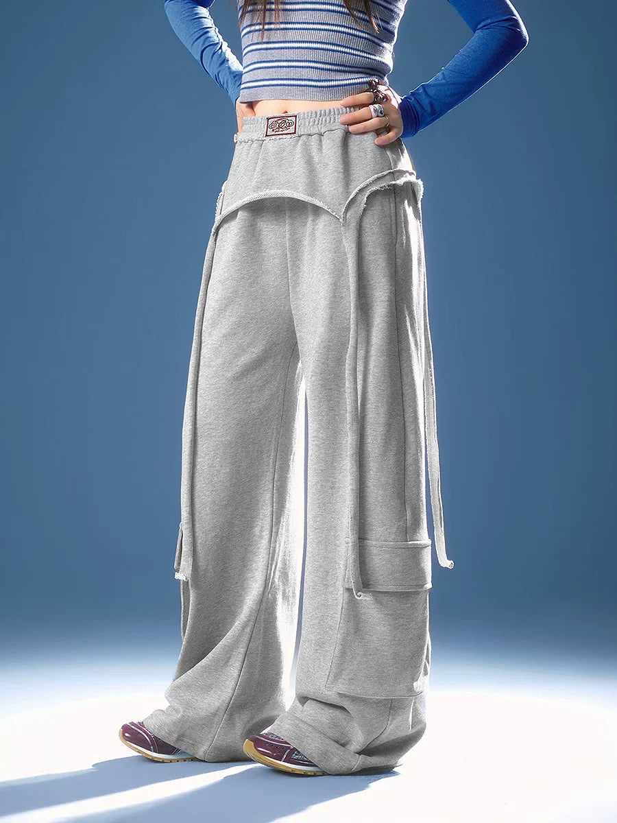 ASYMMETRICAL FRAYED EDGE PANTS