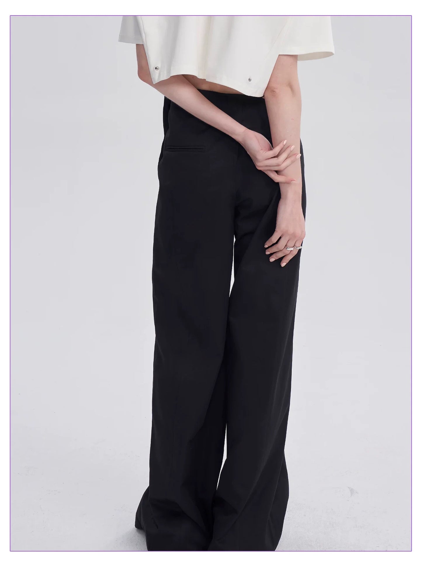 DIAGONAL-WAIST WIDE-LEG PANTS