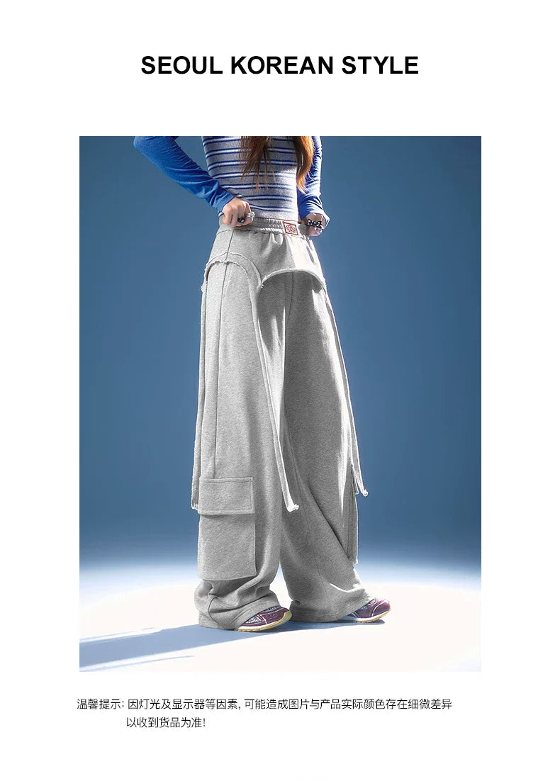 ASYMMETRICAL FRAYED EDGE PANTS