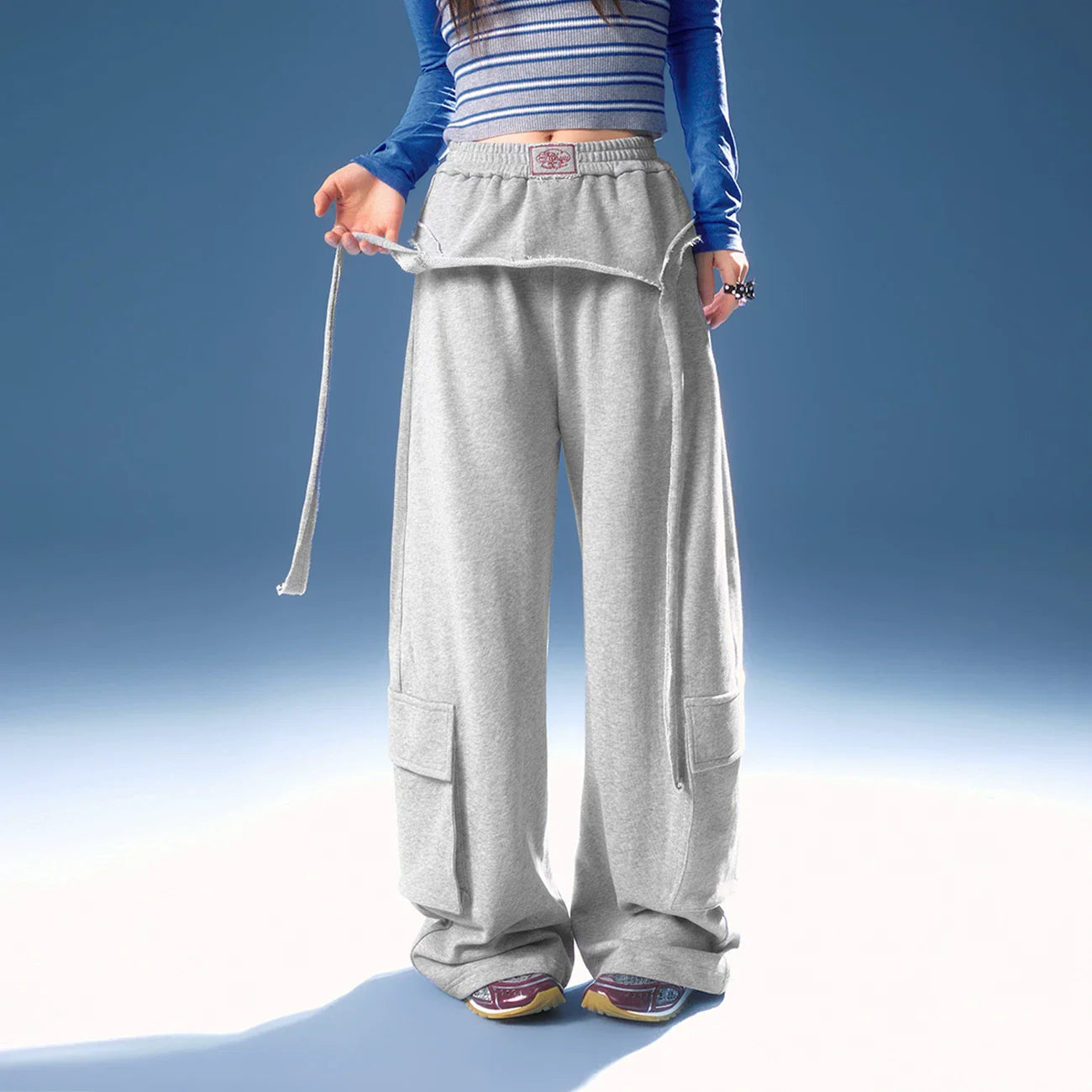 ASYMMETRICAL FRAYED EDGE PANTS